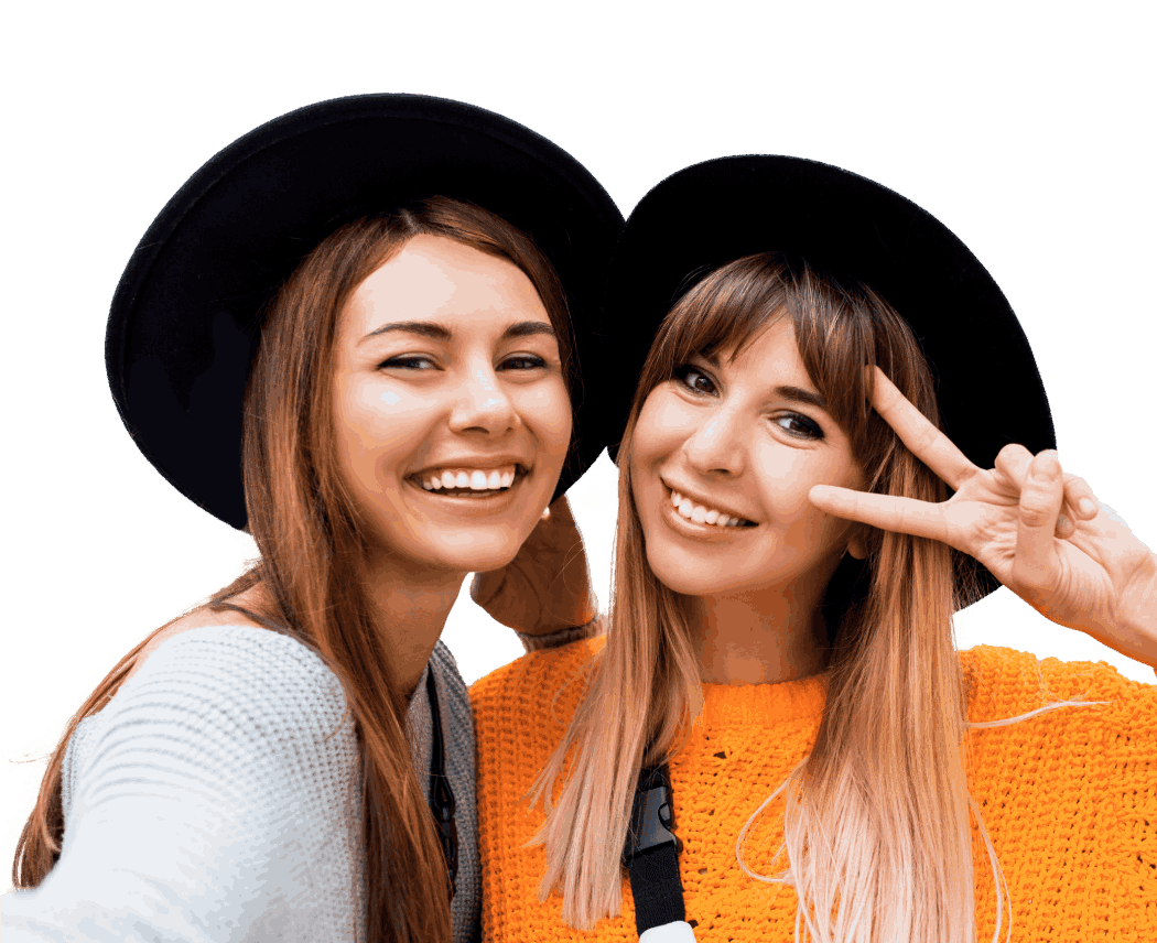 Two young women smiling